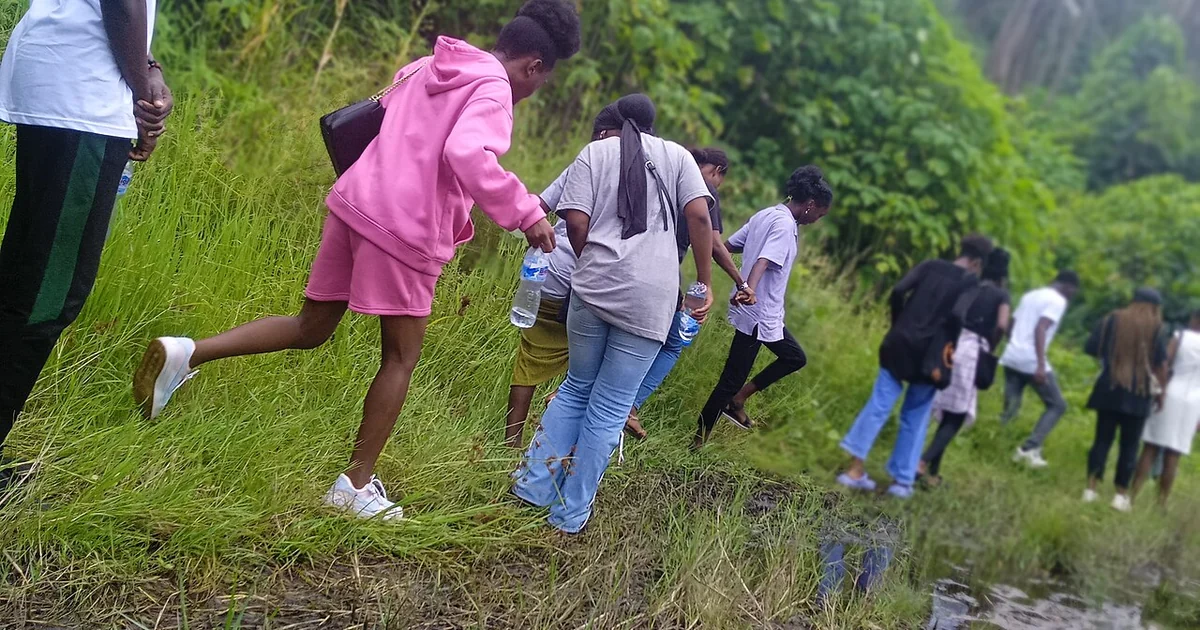 Exploring the lush tropical landscape together after the rain